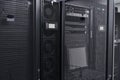 Modern server racks and data center equipment in a secure IT infrastructure room with network hardware Royalty Free Stock Photo