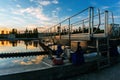 Modern sewage treatment plant. Round wastewater purification tanks at sunset