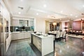 Modern and shiny kitchen with dining and living area