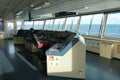 The Modern ShipÃ¢â¬â¢s Bridge control console with navigational equipment of container ship with view on the sea.