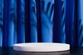 Modern Showcase With Empty Space on Pedestal on Blue Curtains Background. 3d rendering.