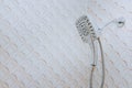 Modern shower head showing drops and streams of water Royalty Free Stock Photo