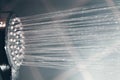 Modern shower head splashing water close up. Royalty Free Stock Photo