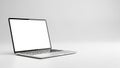 Modern silver laptop computer with a blank white screen open on a clean white background in a studio setting Royalty Free Stock Photo