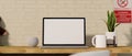 Modern simple workspace with laptop mockup on wooden table