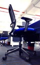 Modern chair row of the work station an information technology company. Royalty Free Stock Photo