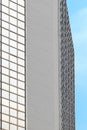 Modern skyscraper facade in blue sky background Royalty Free Stock Photo