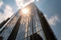 modern skyscraper with reflection of the sun shining in windows Royalty Free Stock Photo
