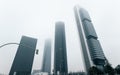 Four Towers Business Area against misty sky. Madrid, Spain Royalty Free Stock Photo