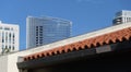 Modern skyscrapers behind tradition southern tile roof in Seaport Village Royalty Free Stock Photo