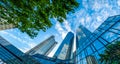 Modern skyscrapers in business district against blue sky