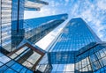 Modern skyscrapers in business district against blue sky