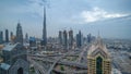 Modern skyscrapers and busy evening highways day to night timelapse in luxury Dubai city, Dubai, United Arab Emirates Royalty Free Stock Photo