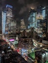 Modern skyscrapers of the Midtown Manhattan skyline in New York City with colorful night lights Royalty Free Stock Photo