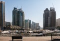 Modern skyscrapers and water pier of Dubai Marina