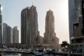 Modern skyscrapers and water pier of Dubai Marina