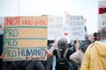 Modern slavery. Cape Town, South African - October 2, 2021 Unrecognisable demonstrators holding up signs and protesting Royalty Free Stock Photo