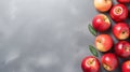 Modern And Sleek Apples On Gray Table Royalty Free Stock Photo