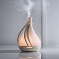 Modern Sleek Essential Oil Diffuser with Gentle Mist in Minimalist Setting Royalty Free Stock Photo