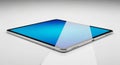 Sleek Silver Tablet Device with Bright Blue Screen Display on White Surface technology Royalty Free Stock Photo