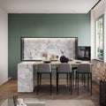 Modern small apartment interior with green kitchen and white marble details