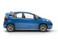 Modern small blue compact car - side view