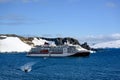 Expedition Ship, Cruiser, Cruise Liner in Antarctica with Zodiacs in front. Hanseatic nature cruiser from Hapag Lloyd Cruises.