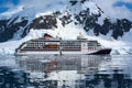 Expedition Ship, Cruiser, Cruise Liner in Antarctica with Zodiacs in front. Hanseatic Nature from Hapag Lloyd Cruises.