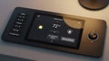 Smart Home Control Panel with Touchscreen Display for Lights, Climate, Security and Entertainment Royalty Free Stock Photo