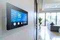 Modern smart home interface on a digital wall-mounted control panel with icons Royalty Free Stock Photo