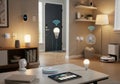 Modern smart home interior featuring interconnected devices. A tablet on a coffee table displays a Royalty Free Stock Photo