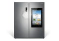 Modern smart refrigerator with integrated touchscreen display isolated on white background Royalty Free Stock Photo