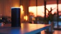 A modern smart speaker device placed on a table. Ideal for technology concept designs Royalty Free Stock Photo