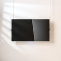 Modern Smart TV panel Mockup with blank screen hanging on the wall by ropes