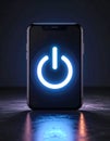 Smartphone with Glowing Power Button Icon Royalty Free Stock Photo