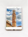 Modern smartphone displaying full screen picture of Verona, Ital