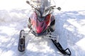 modern snowmobile scooter vehicle on snow in mountain road.rental automobile extreme sport adventure