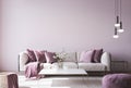 Wall mock up for modern sofa on light pink wall background with trendy home accessories Royalty Free Stock Photo