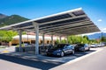 A modern solar carport for public vehicle parking is outfitted with solar panels producing renewable energy. Generative AI