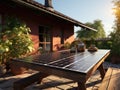 Modern solar panel on th roof with plants at morning, Solar panel on red roof reflecting sun and cloudless blue sky. Ai generative Royalty Free Stock Photo