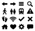 Modern solid user interface icon set featuring arrows, a home, heart, train, people, and essential navigation symbols for web and Royalty Free Stock Photo