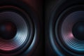 Modern sound speakers in neon light as background, closeup Royalty Free Stock Photo