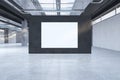 Modern spacious concrete warehouse garage interior with empty white mock up poster. Space and design concept. Royalty Free Stock Photo