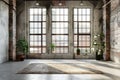 Modern spacious loft with large industrial windows and plants Royalty Free Stock Photo