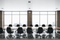 Modern spacious meeting room with big window, wooden table in the center and black chairs around Royalty Free Stock Photo