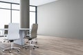 Modern spacious meeting room interior with blank mock up place on wall, white chairs, wooden parquet flooring and panoramic window Royalty Free Stock Photo