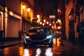 Modern Sports car at night on an old cobbled wet street