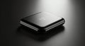 Sleek Black Wireless Charging Case with Subtle Wave Symbol on Dark Reflective Surface Royalty Free Stock Photo