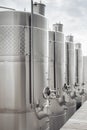 Modern stainless steel barrels for wine fermentation at a winery. Wine industry. Royalty Free Stock Photo