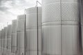 Modern stainless steel barrels for wine fermentation at a winery. Wine industry.